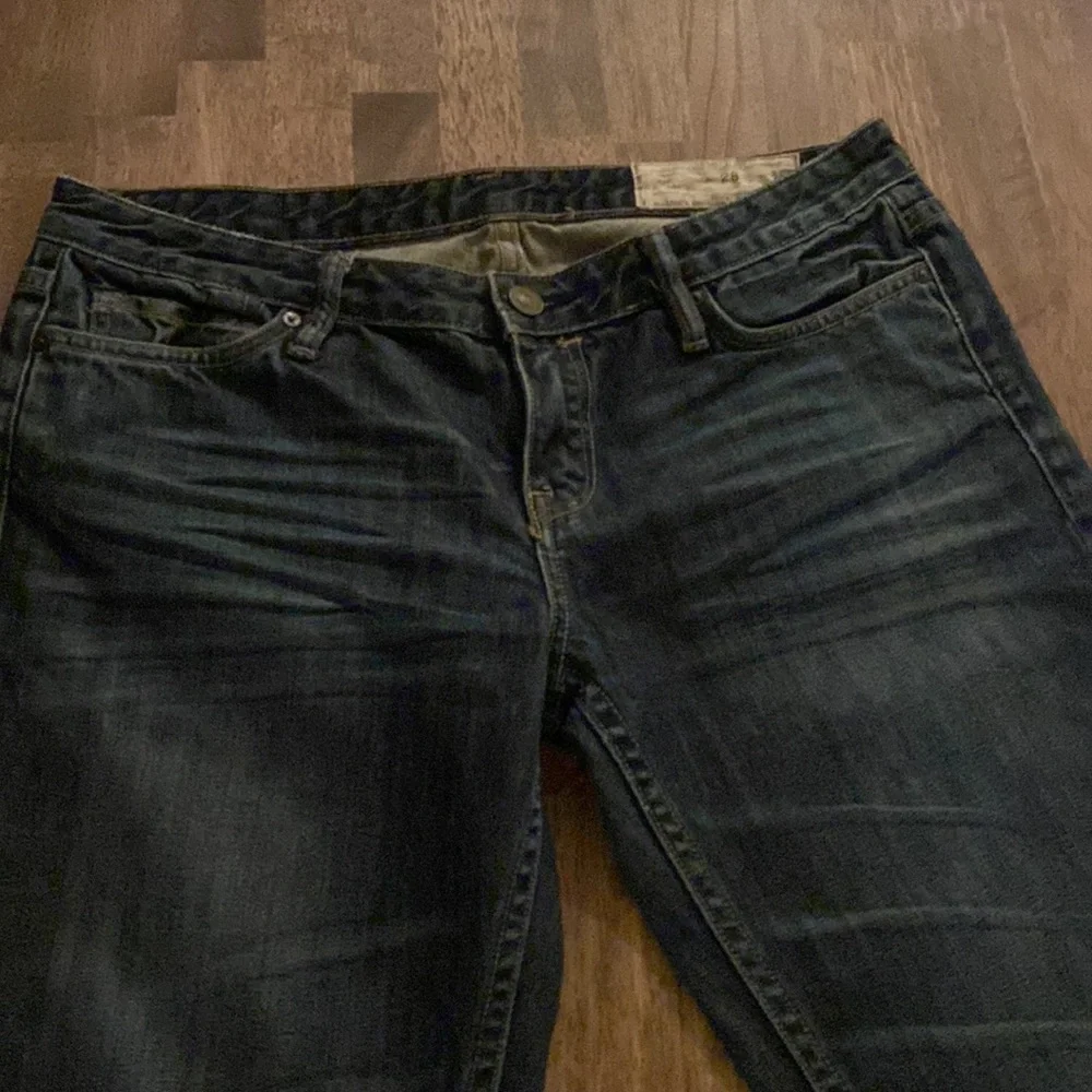 All Saints Spitalfields Jack’s Place skinny dark blue jeans from Neiman Marcus